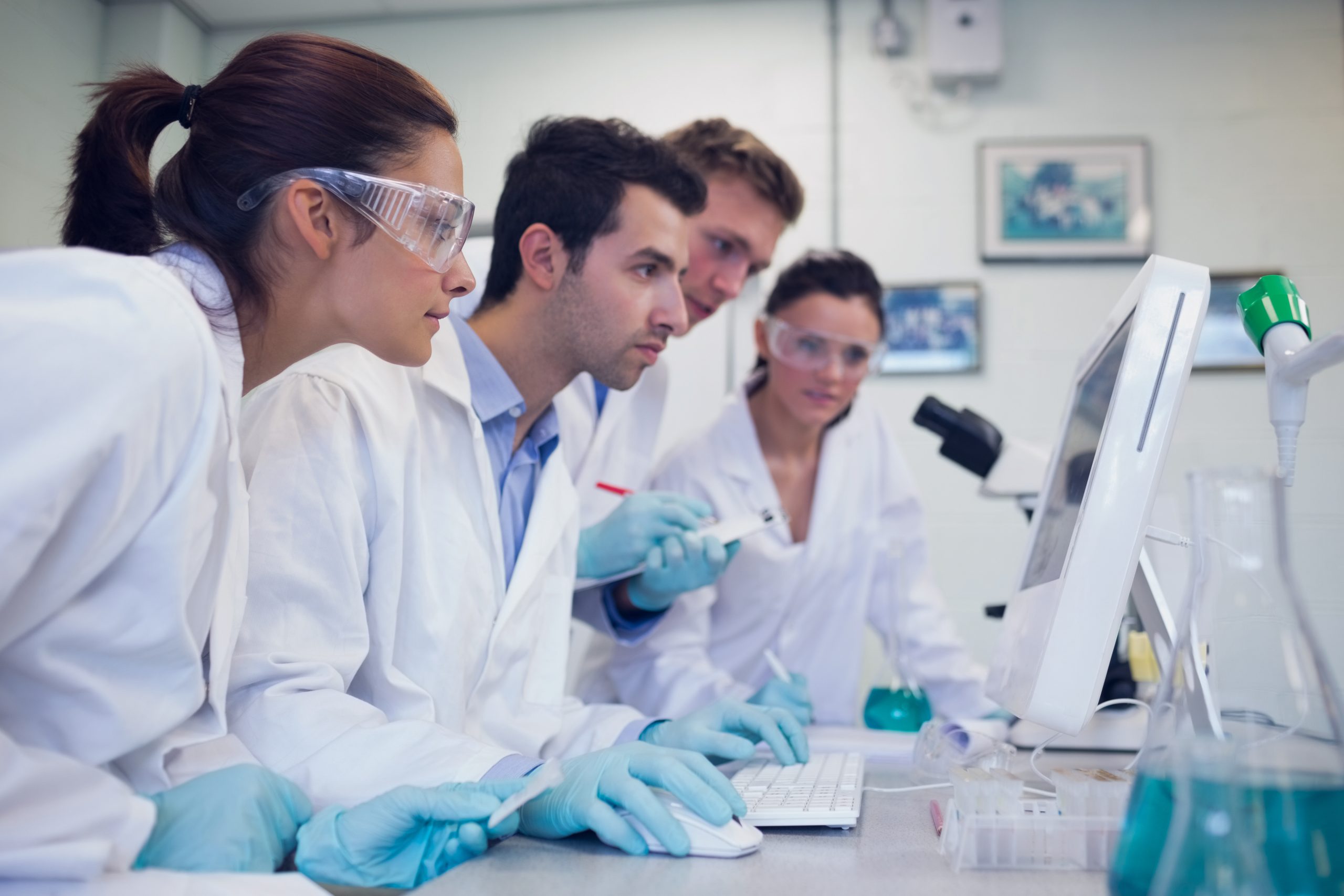 Medical professionals reviewing information together