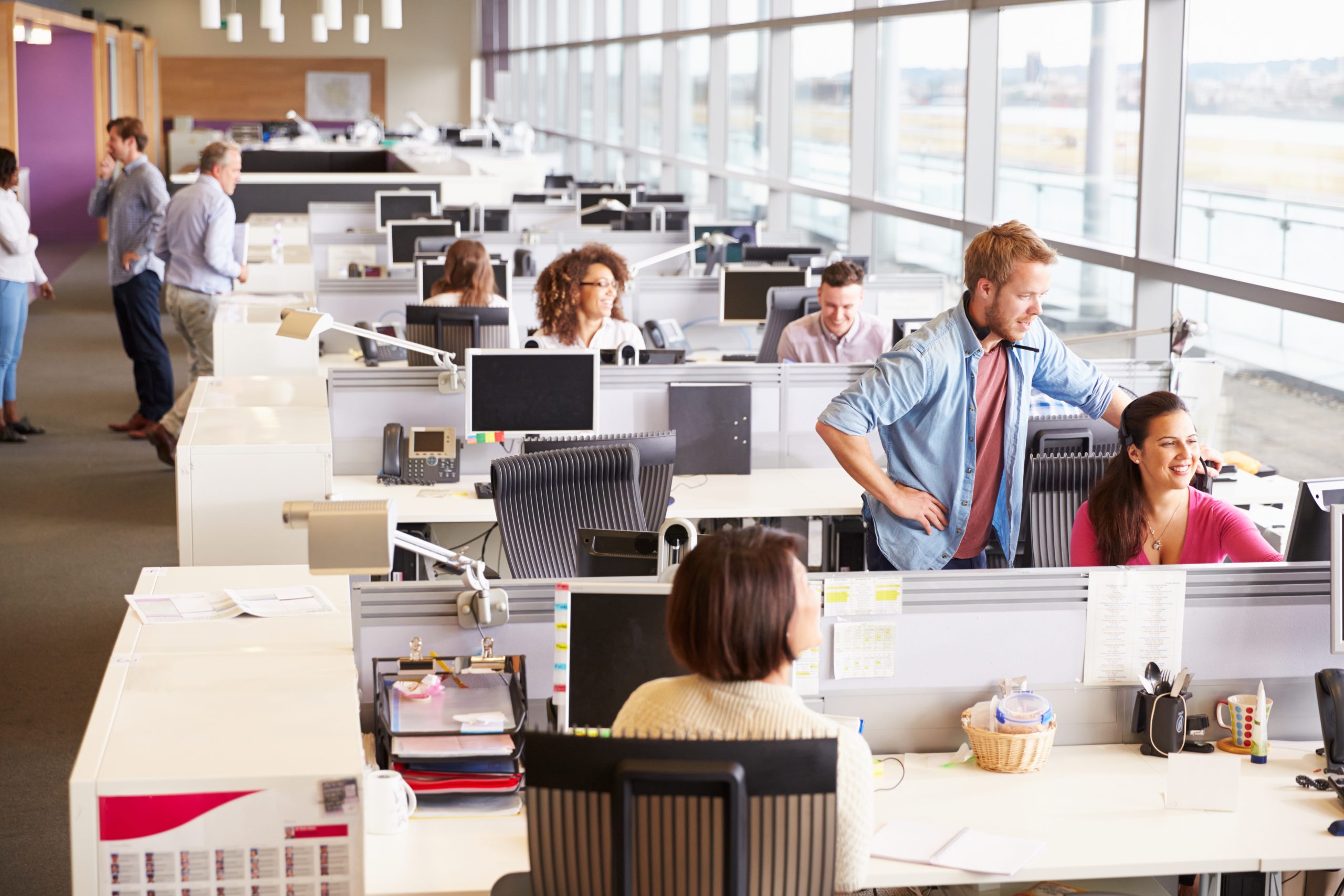 Open office workspace with employees