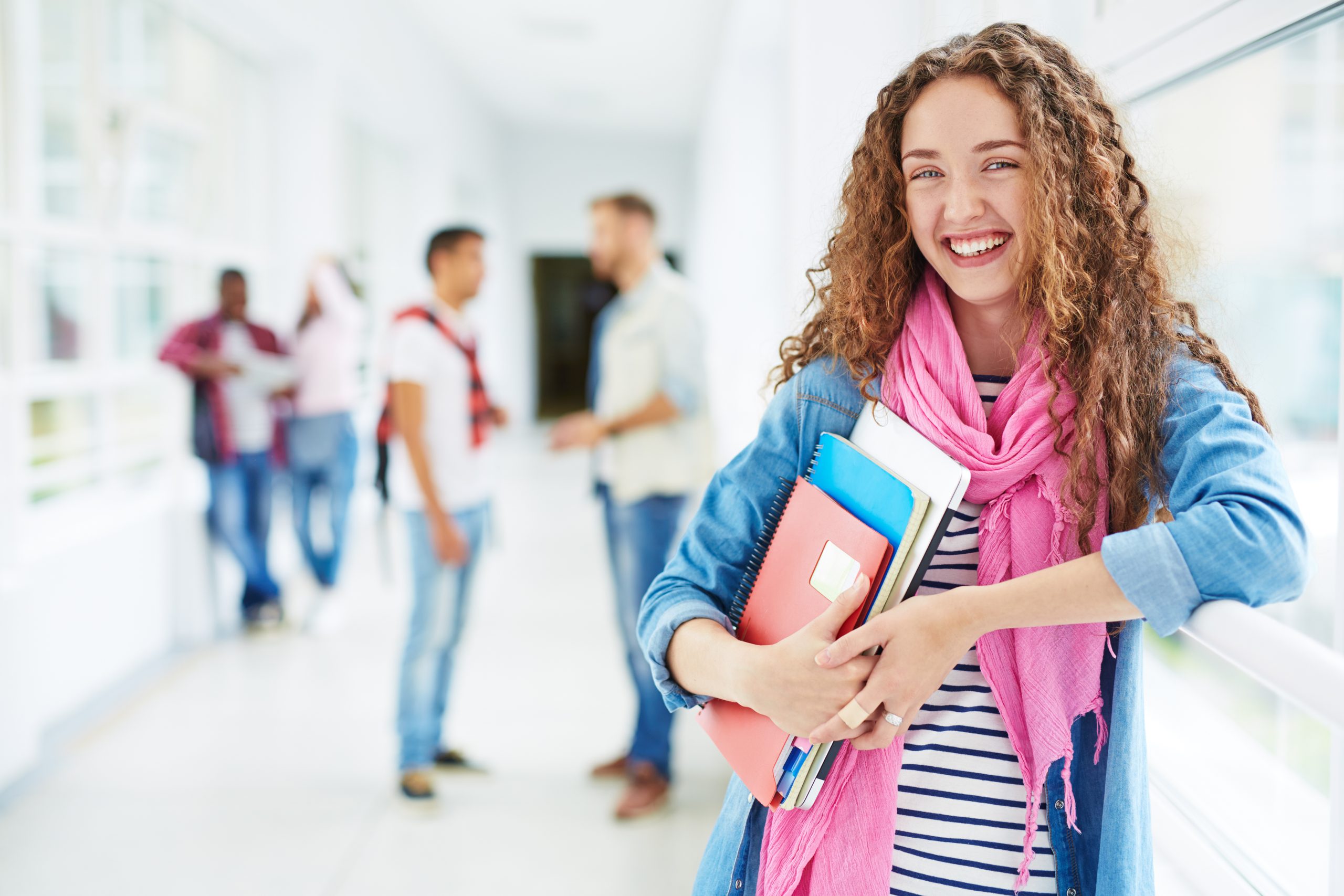 Person smiling in a school setting