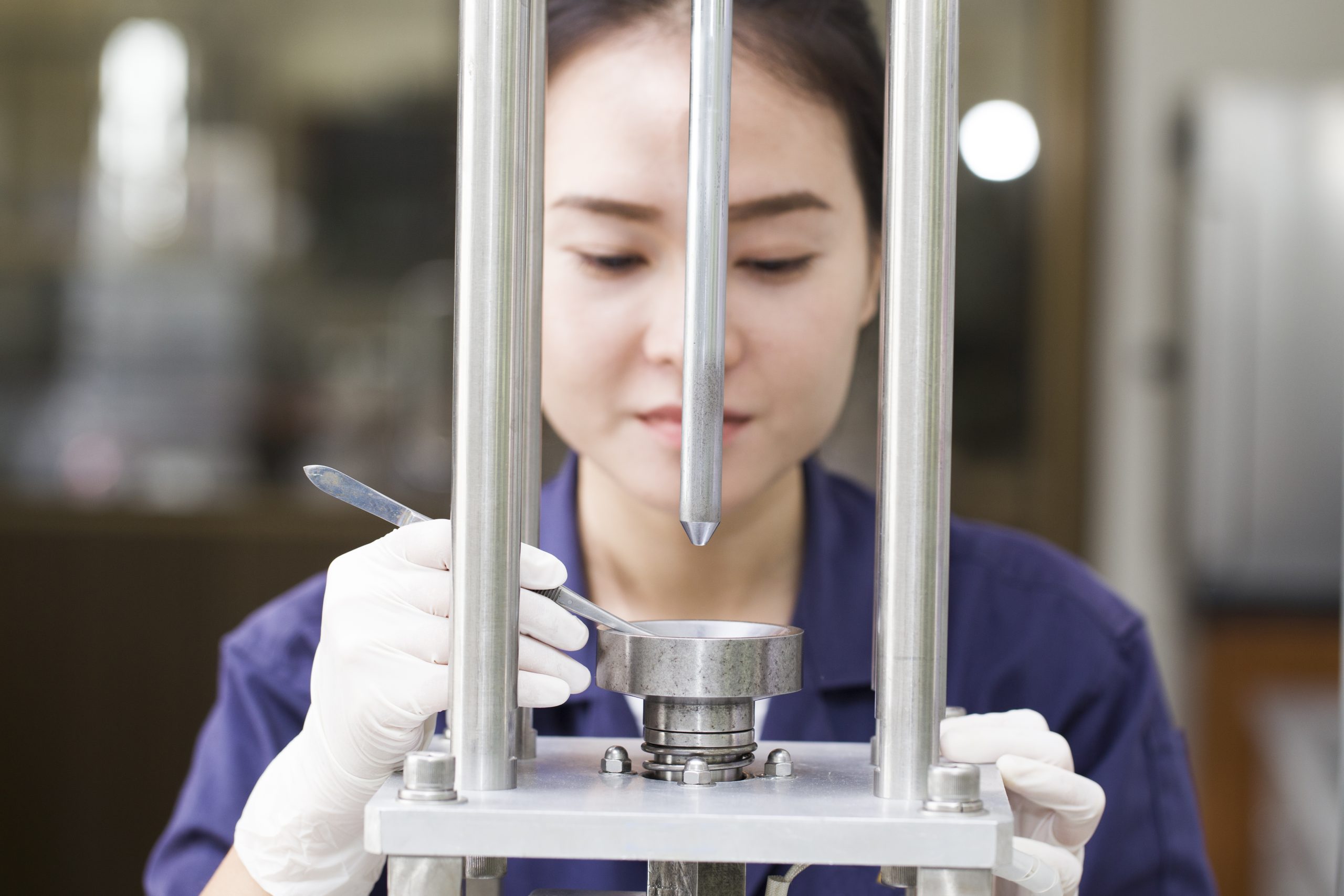 Scientist working with lab equipment