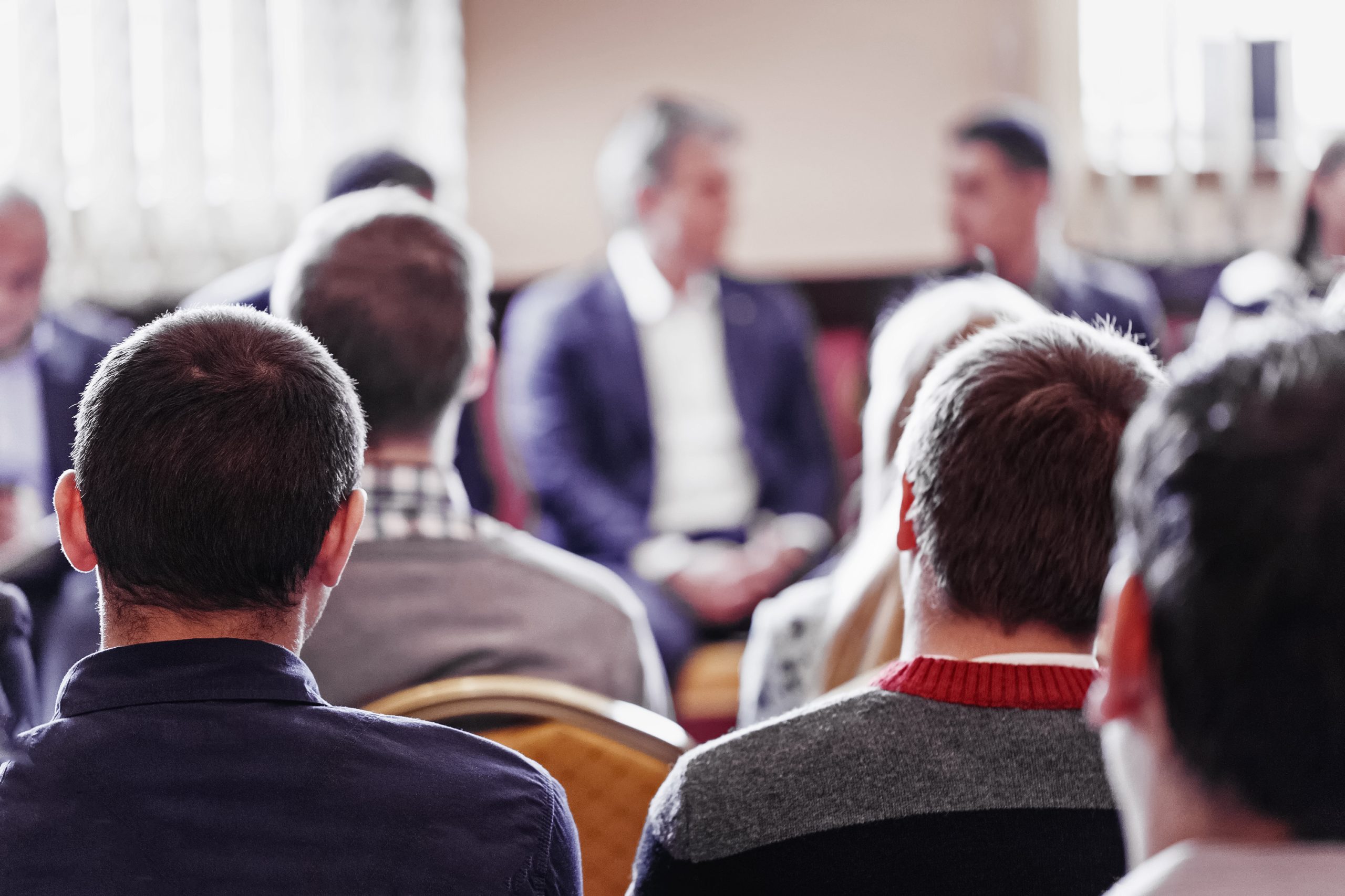 Audience listening to speaker at event