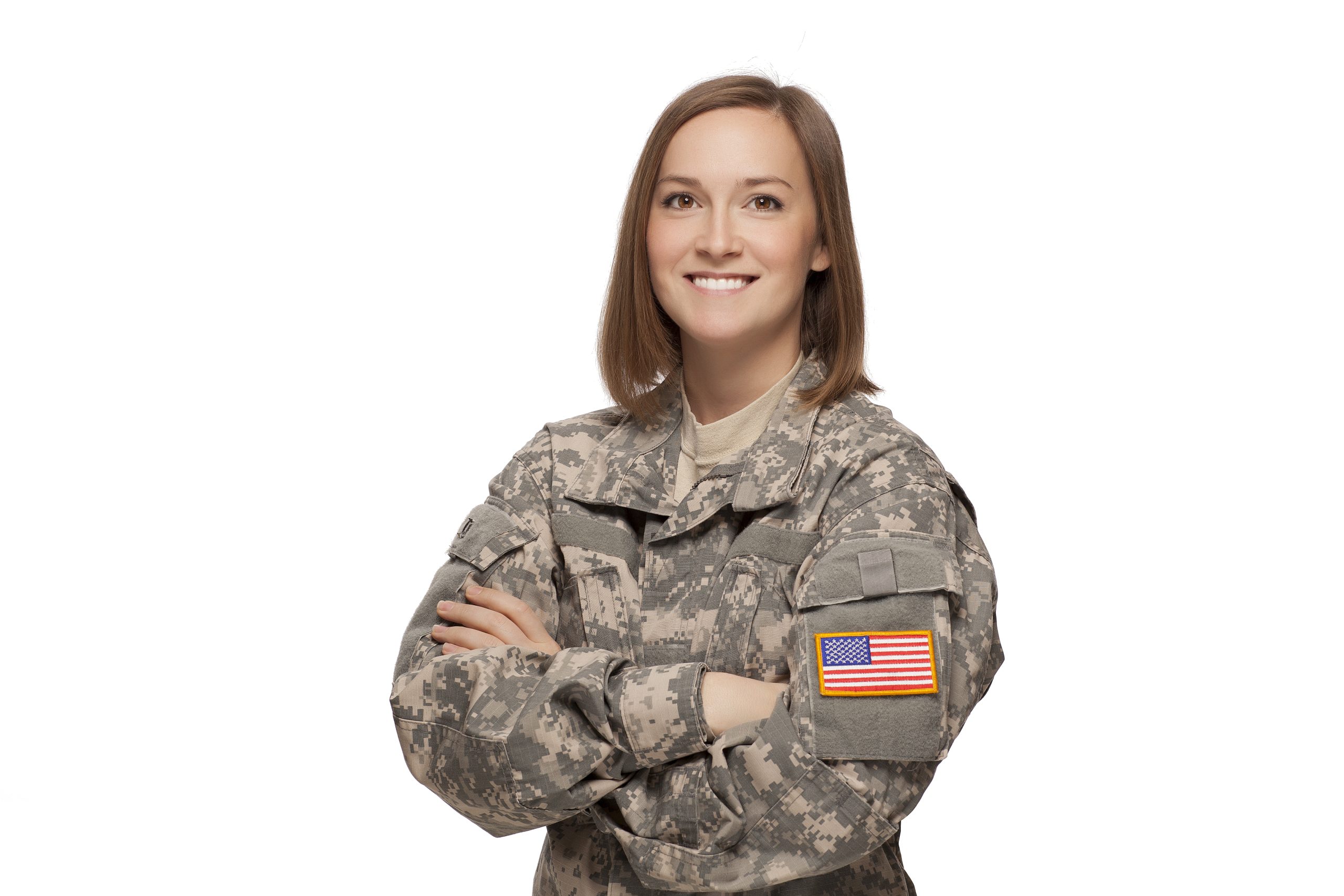 Service member in uniform with arms crossed